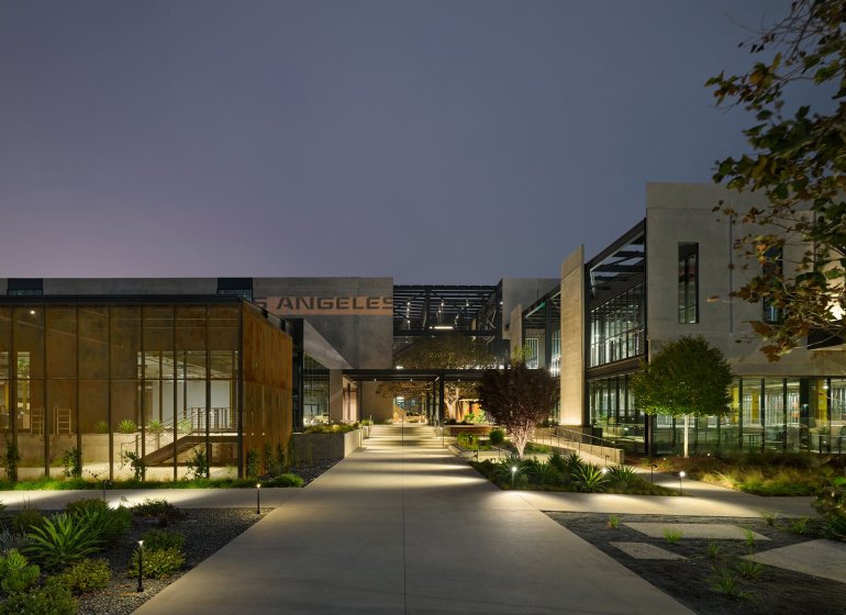 The Press entry court and west balconies at night